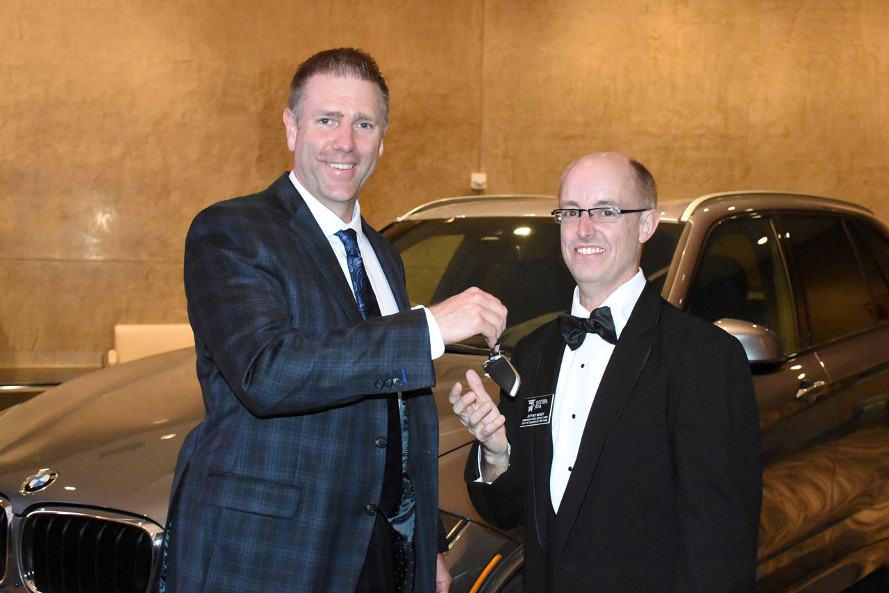 2018-2019 Teacher of the Year is handed over keys to a 2018 Space Gray Metallic BMW X5 xDrive35i. 