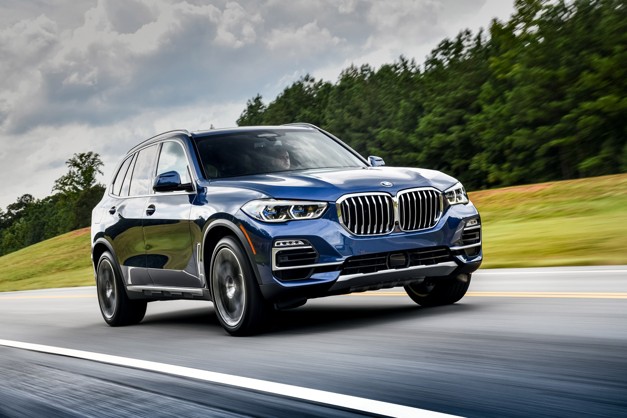 Gorgeous new BMW X5 being driven down a countryside road in the U.S. 