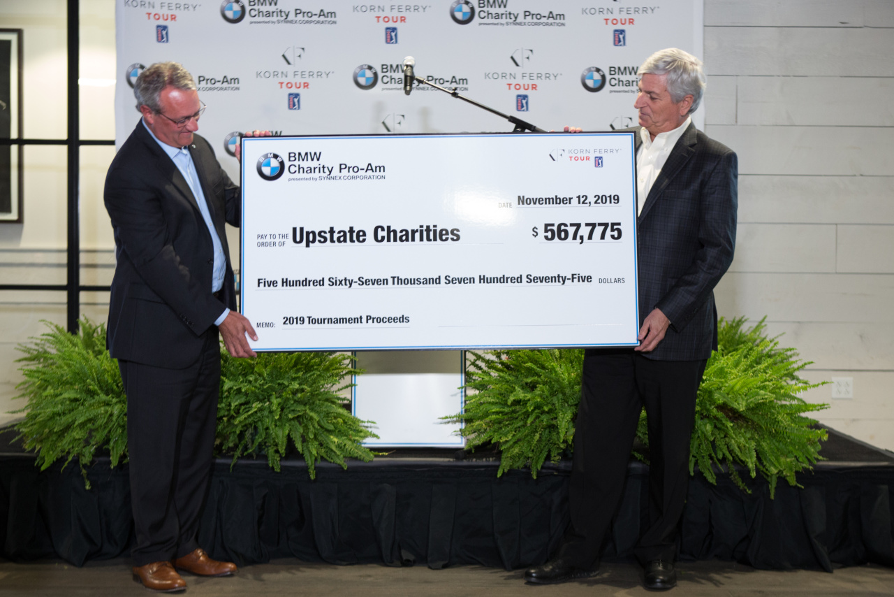 Upstate Charities are awarded a check for 567,775 dollars. 